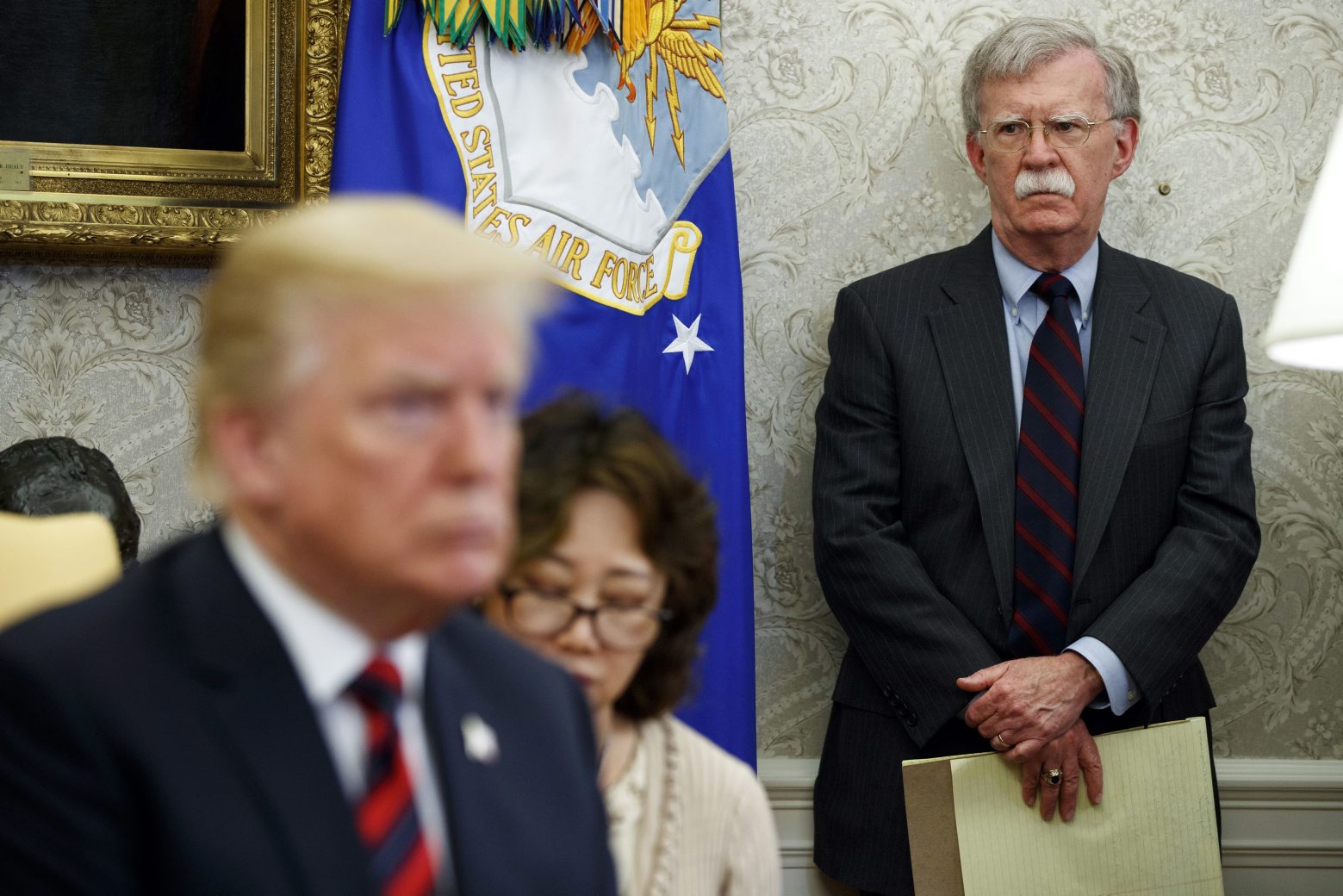 In this May 22, 2018, file photo, U.S. President Donald Trump, left, meets with South Korean President Moon Jae-In in the Oval Office of the White House in Washington, as national security adviser John Bolton, right, watches. Trump says he fired national security adviser John Bolton, says they 'disagreed strongly' on many issues. (AP Photo/Evan Vucci, File)
Donald Trump,John Bolton Trump Bolton
