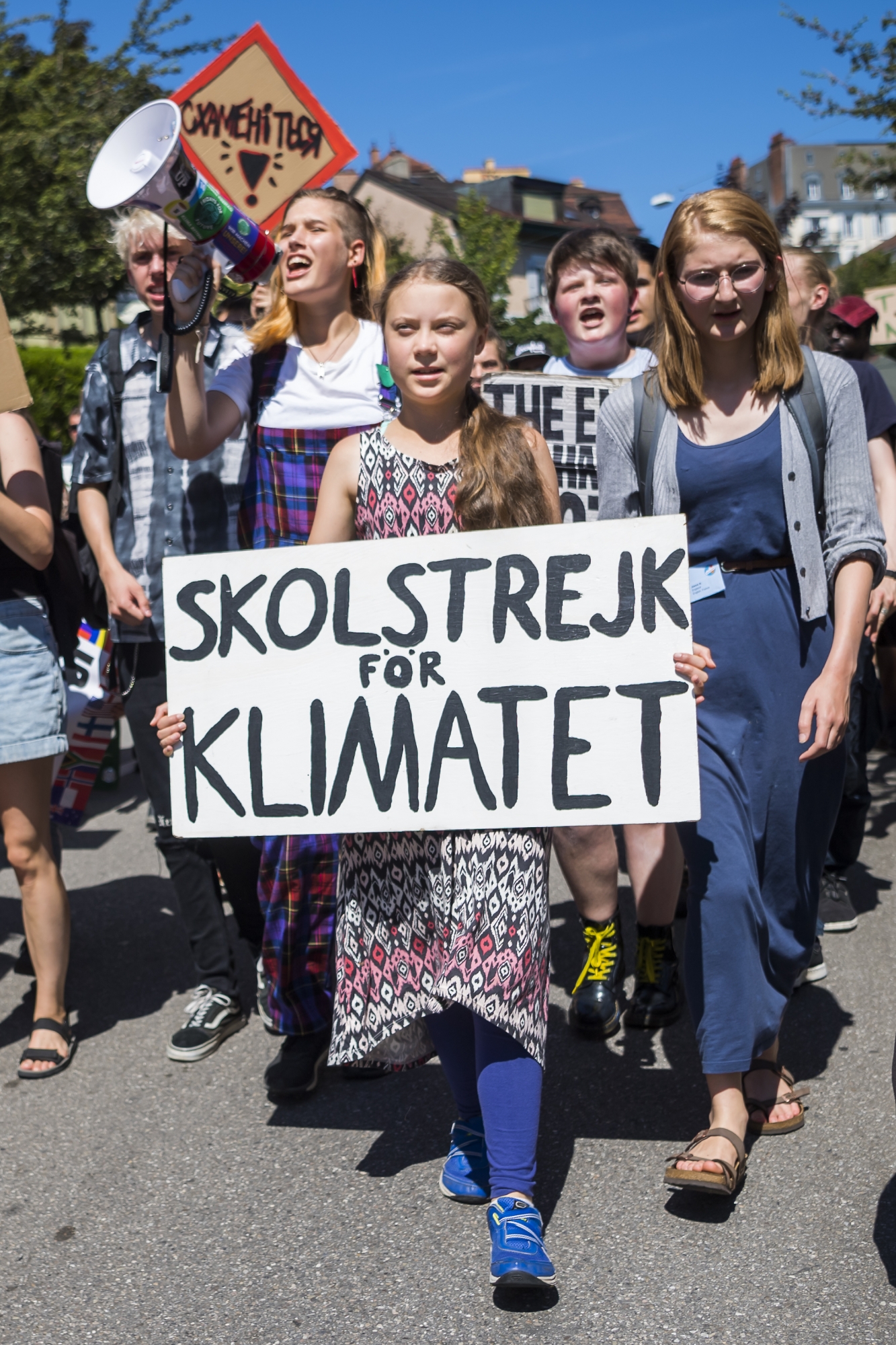 Swedish climate activist Greta Thunberg reacts with other young climate activists during a demonstration against climate change on the closing day of the Â«Â Smile for Future Summit for climateÂ Â», in Lausanne, Switzerland, on Friday, August 9, 2019. More than 450 participants from 37 different countries met this week in Lausanne for the summer gathering of the Â«Â Fridays for FutureÂ Â» movement. (KEYSTONE/Jean-Christophe Bott) SSWITZERAND DEMONSTRATION CLIMATE
