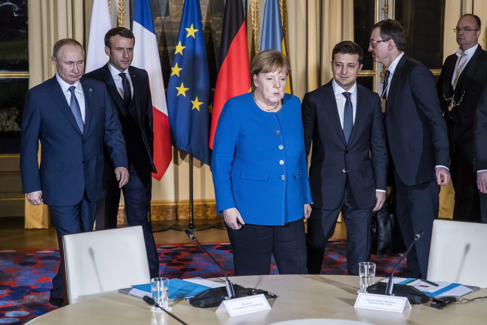 epa08057644 (L-R) Russian President Vladimir Putin, French President Emmanuel Macron, German Chancellor Angela Merkel, Ukrainian President Volodymyr Zelensky attend their summit on Ukraine at Elysee Palace in Paris, France, 09 December 2019. The Normandy format was created in 2014 to resolve the conflict between Kiev and the breakaway republics in Ukraine's east.  EPA/CHRISTOPHE PETIT TESSON / POOL FRANCE NORMANDY FOUR SUMMIT