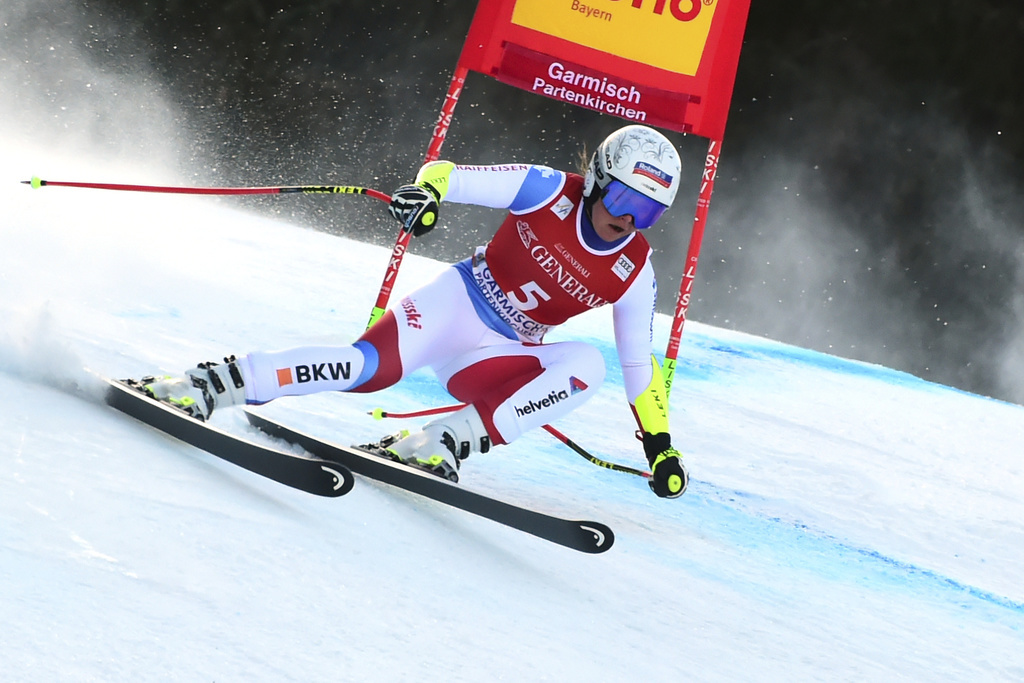 Switzerland's Corinne Suter competes during an alpine ski, women's World Cup super G, in Garmish Partenkirchen, Germany, Sunday, Feb. 9, 2020. (AP Photo/Marco Tacca)