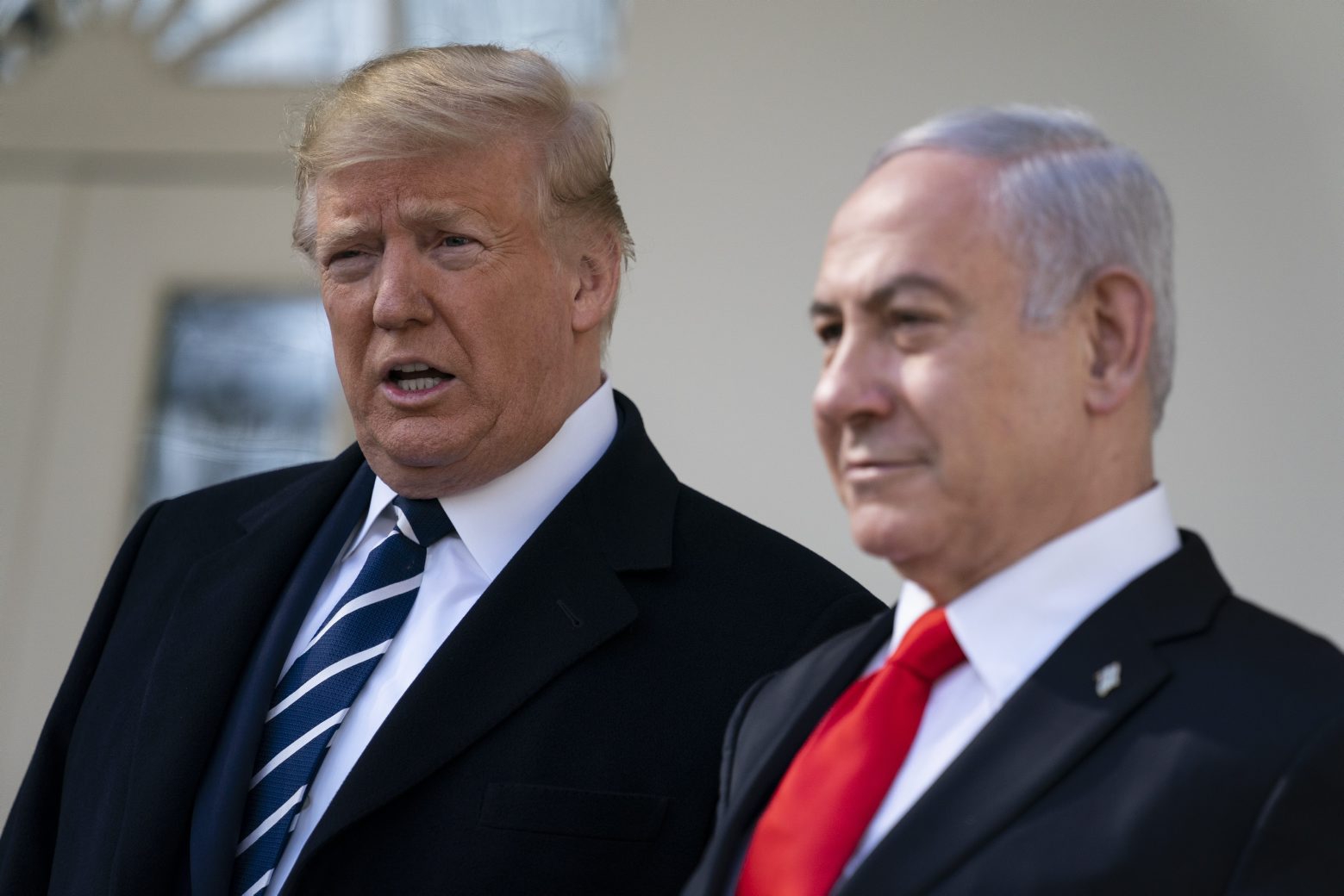 President Donald Trump and Israeli Prime Minister Benjamin Netanyahu talk with reporters before a meeting in the Oval Office of the White House, Monday, Jan. 27, 2020, in Washington. (AP Photo/ Evan Vucci)
Donald Trump,Benjamin Netanyahu Trump