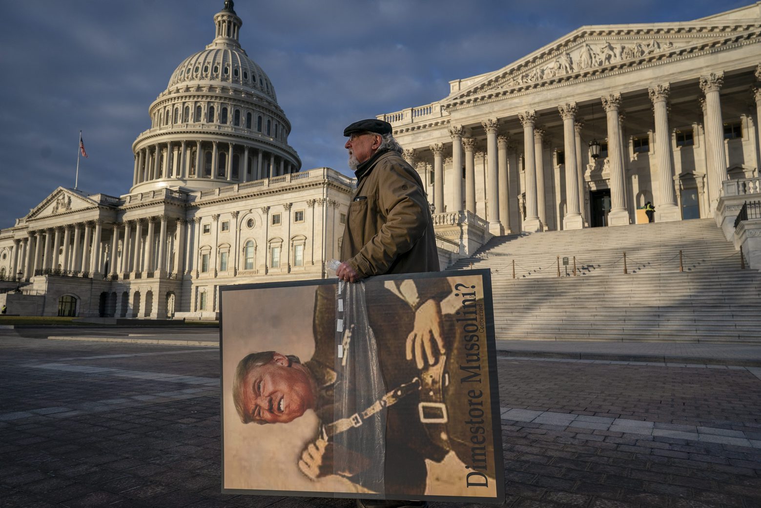 Anti-Trump activist Stephen Parlato of Boulder, Colo., arrives at the Capitol in Washington, early Friday, Jan. 31, 2020, as the Senate resumes the impeachment trial of President Donald Trump on charges of abuse of power and obstruction of Congress. Parlato has taken his message to Congress since the start of the impeachment hearings. (AP Photo/J. Scott Applewhite)
Stephen Parlato Trump Impeachment