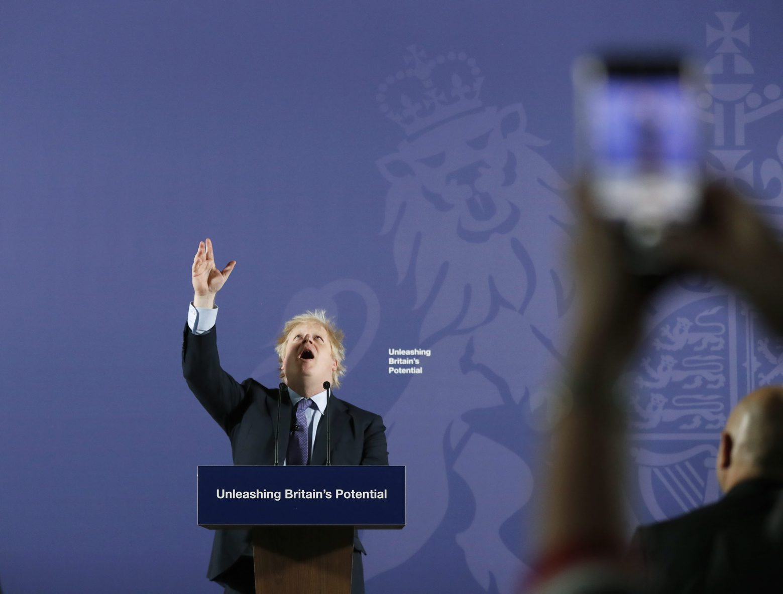 A guest takes images with his mobile phone as British Prime Minister Boris Johnson outlines his government's negotiating stance with the European Union after Brexit, during a key speech at the Old Naval College in Greenwich, London, Monday, Feb. 3, 2020. (AP Photo/Frank Augstein, Pool)
Boris Johnson Britain Brexit