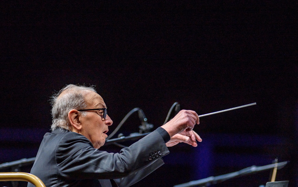 epa07547455 Italian composer and conductor Ennio Morricone performs on occasion of his concert at the Bilbao Exhibition Centre, in Bilbao, northern Spain, 04 May 2019. Morricone is on an international tour before retiring from stages after six decades of music. EPA/Javier Zorrilla